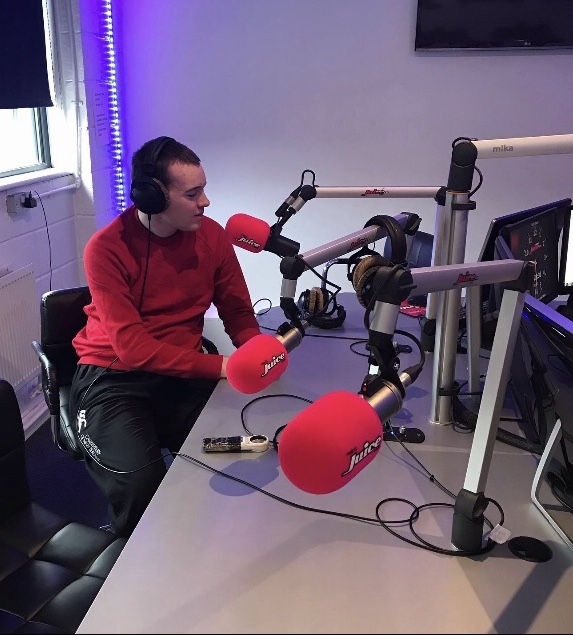 Picture of david in a radio studio
